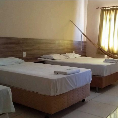 Quarto triplo com três camas